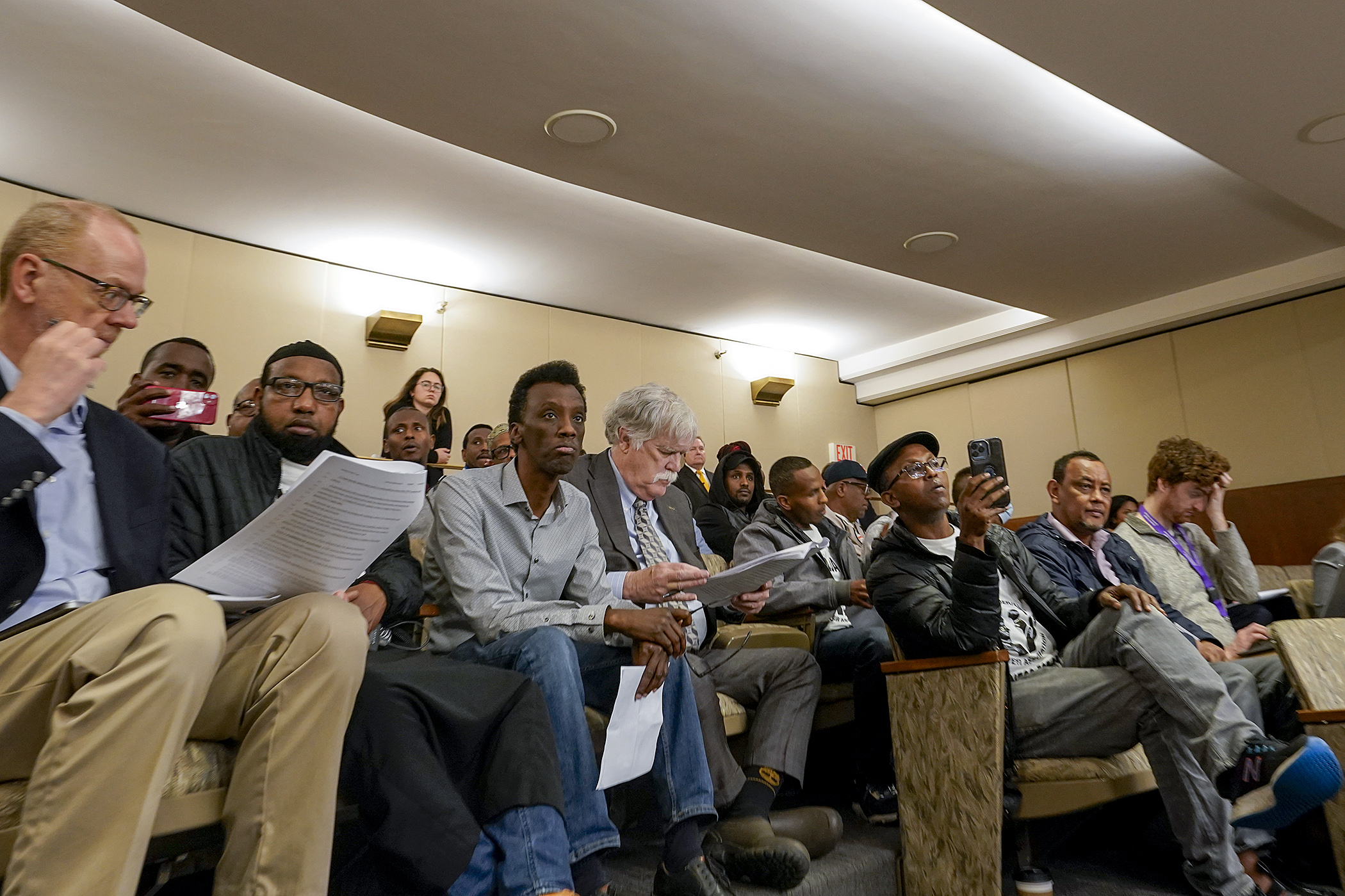 Uber and Lyft rideshare drivers attended the May 7 House Labor and Industry Finance and Policy Committee hearing on a bill to regulate transportation network companies. (Photo by Michele Jokinen)
